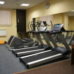 Занятия йогой, фитнесом в спортзале Атом Балашиха