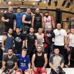 Занятия йогой, фитнесом в спортзале Боец Гай