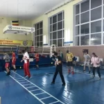 Занятия йогой, фитнесом в спортзале Боевые перчатки Видное