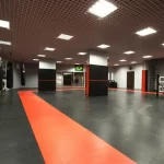 Занятия йогой, фитнесом в спортзале Fight Lab Строитель