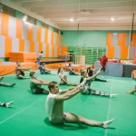 Занятия йогой, фитнесом в спортзале Секция акробатики и гимнастики АкроРитм Москва
